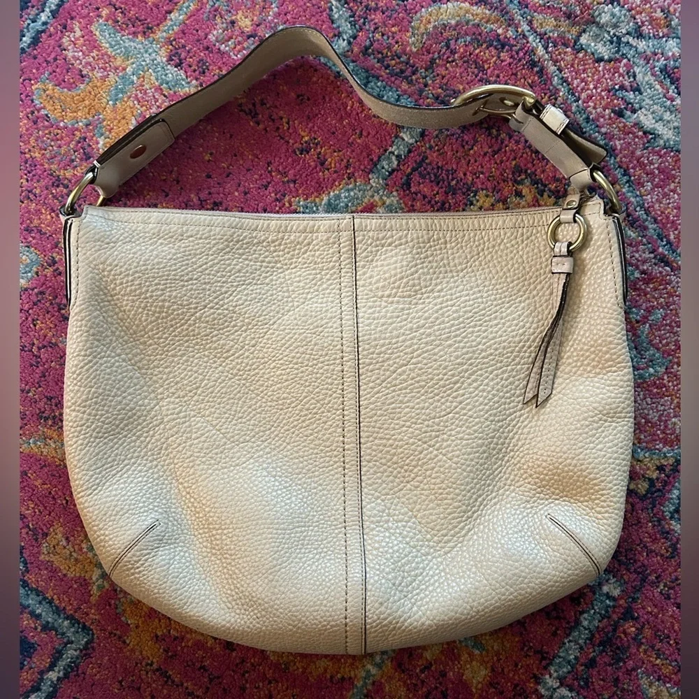 Coach | Women’s cream pebbled leather round bottom over the shoulder purse, OS